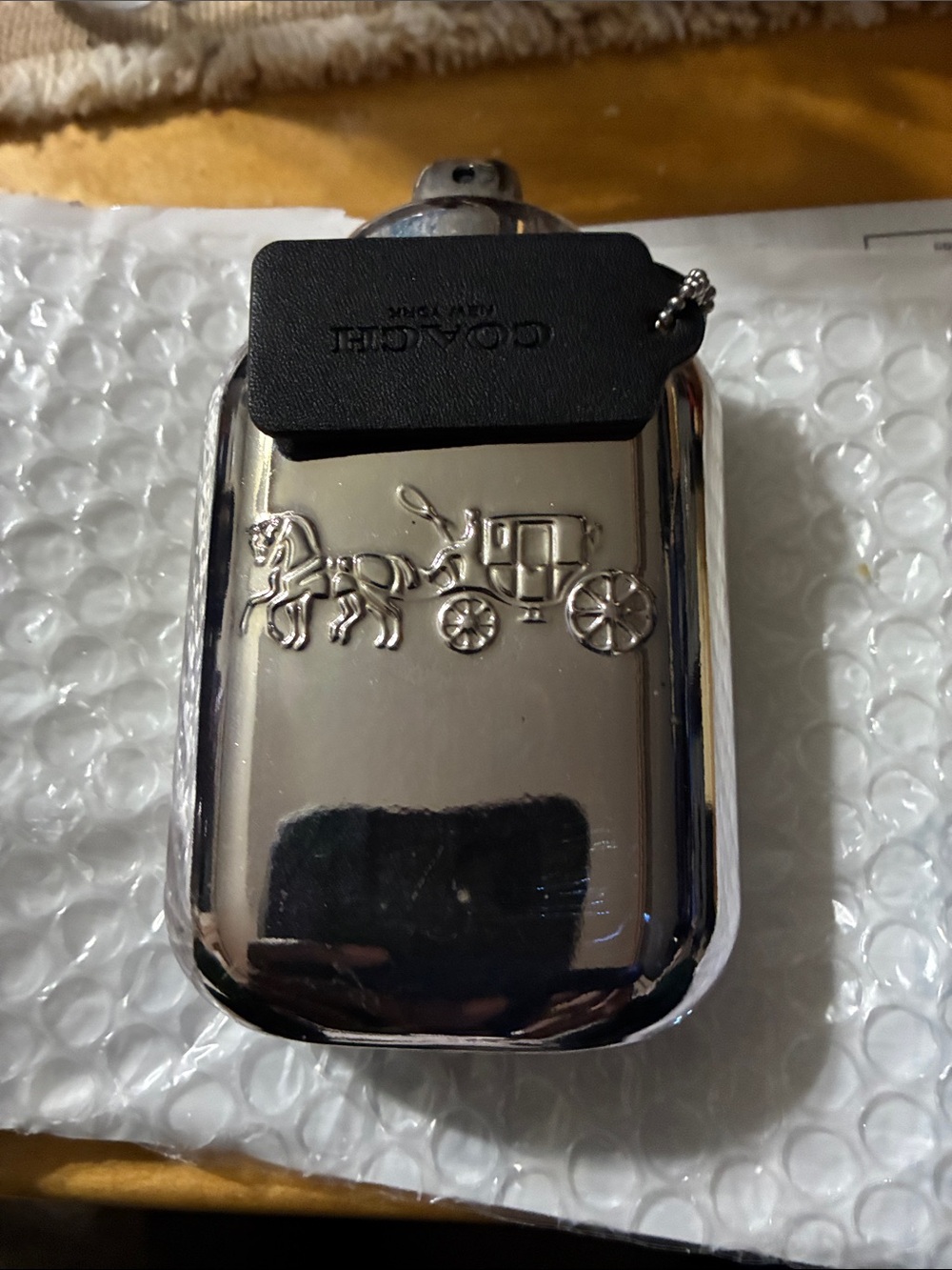 Coach Silver Tone Horse & Carriage Phone Charm with Black Leather Tag